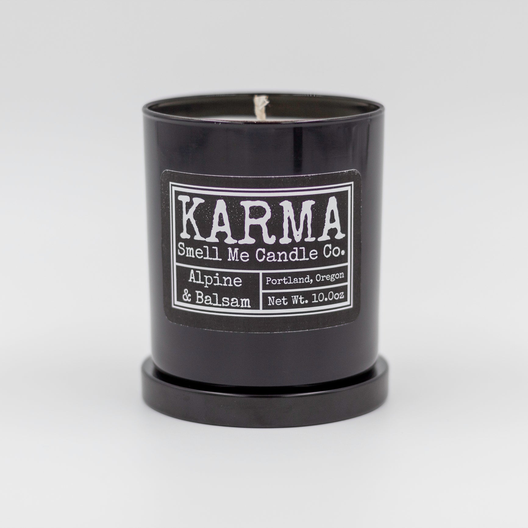 https://smellmecandlecompany.com/cdn/shop/products/KARMA-Alpine_Balsam-10ozBlackGlassTumblerStockPhoto-SmellMeCandleCo..jpg?v=1677467252